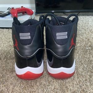 Jordan Bred 11s size 11. Barely worn don’t have the box for them
